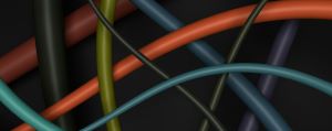 Close up of criss-crossing colour cables.